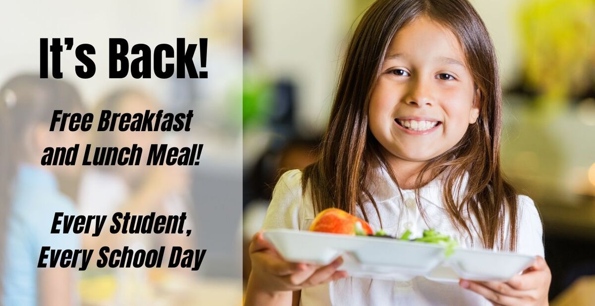 child holding lunch tray